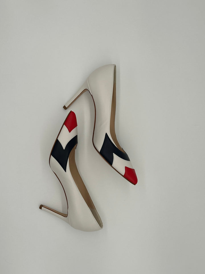 Lead solo air force thunderbird inspired red white and blue pumps.